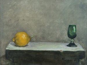 Still life with lemon and green glass